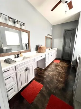 a kitchen with a sink stove and refrigerator