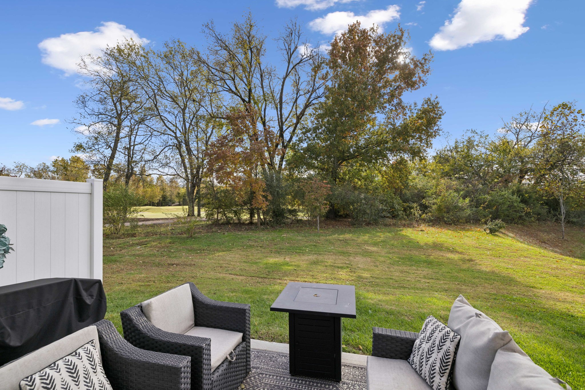 647 Birdie Drive Spring Hill, TN 37174 - Photo 12 of 15 a view of a lake with couches chairs