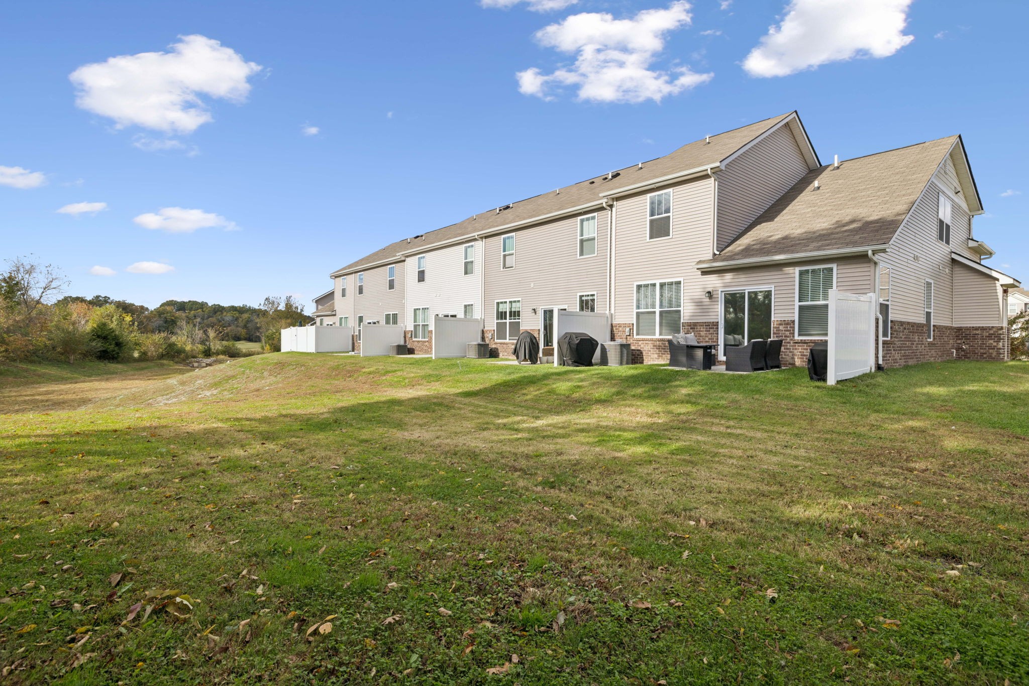 647 Birdie Drive Spring Hill, TN 37174 - Photo 14 of 15 a view of a house with a big yard