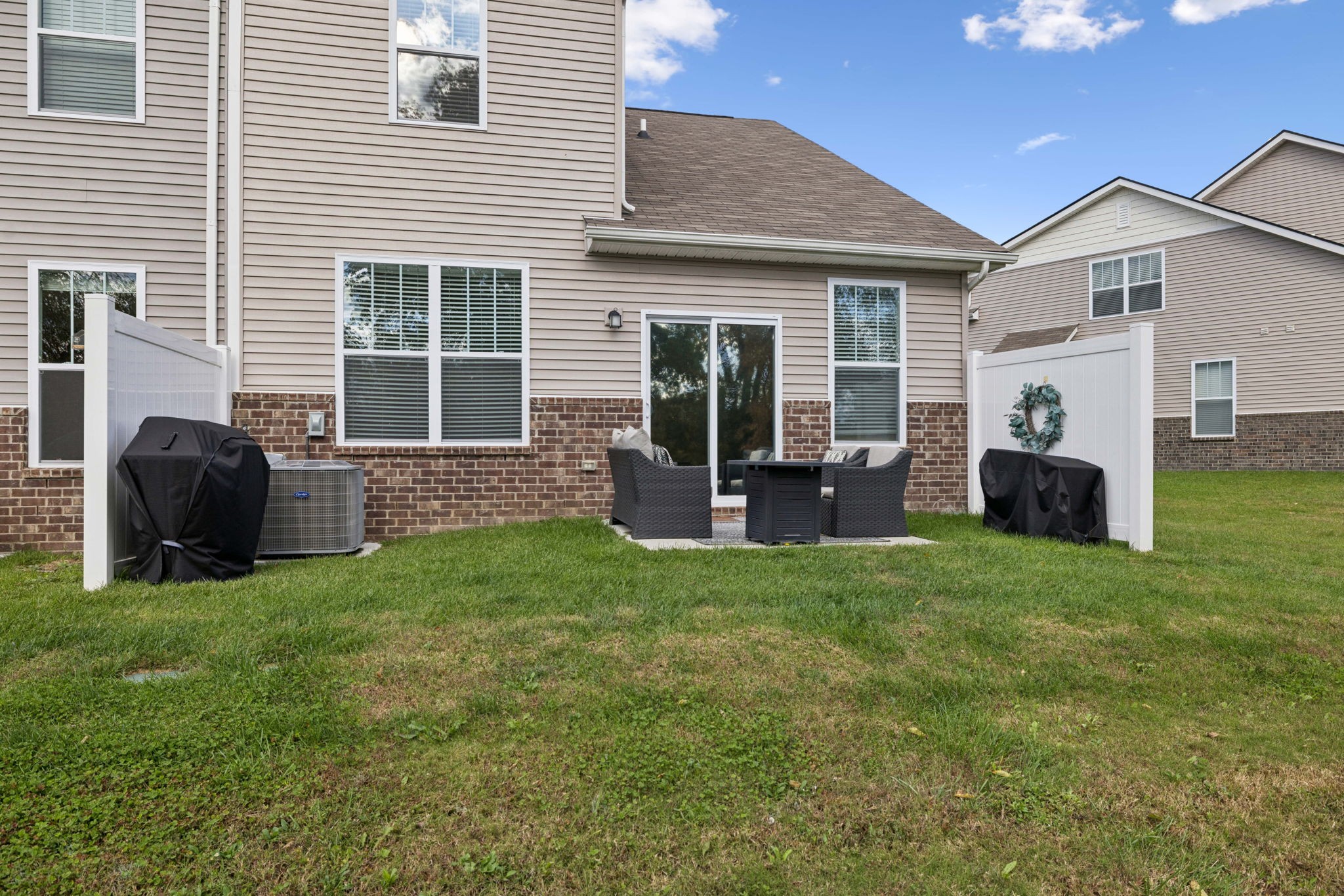 647 Birdie Drive Spring Hill, TN 37174 - Photo 15 of 15 a view of a house with backyard