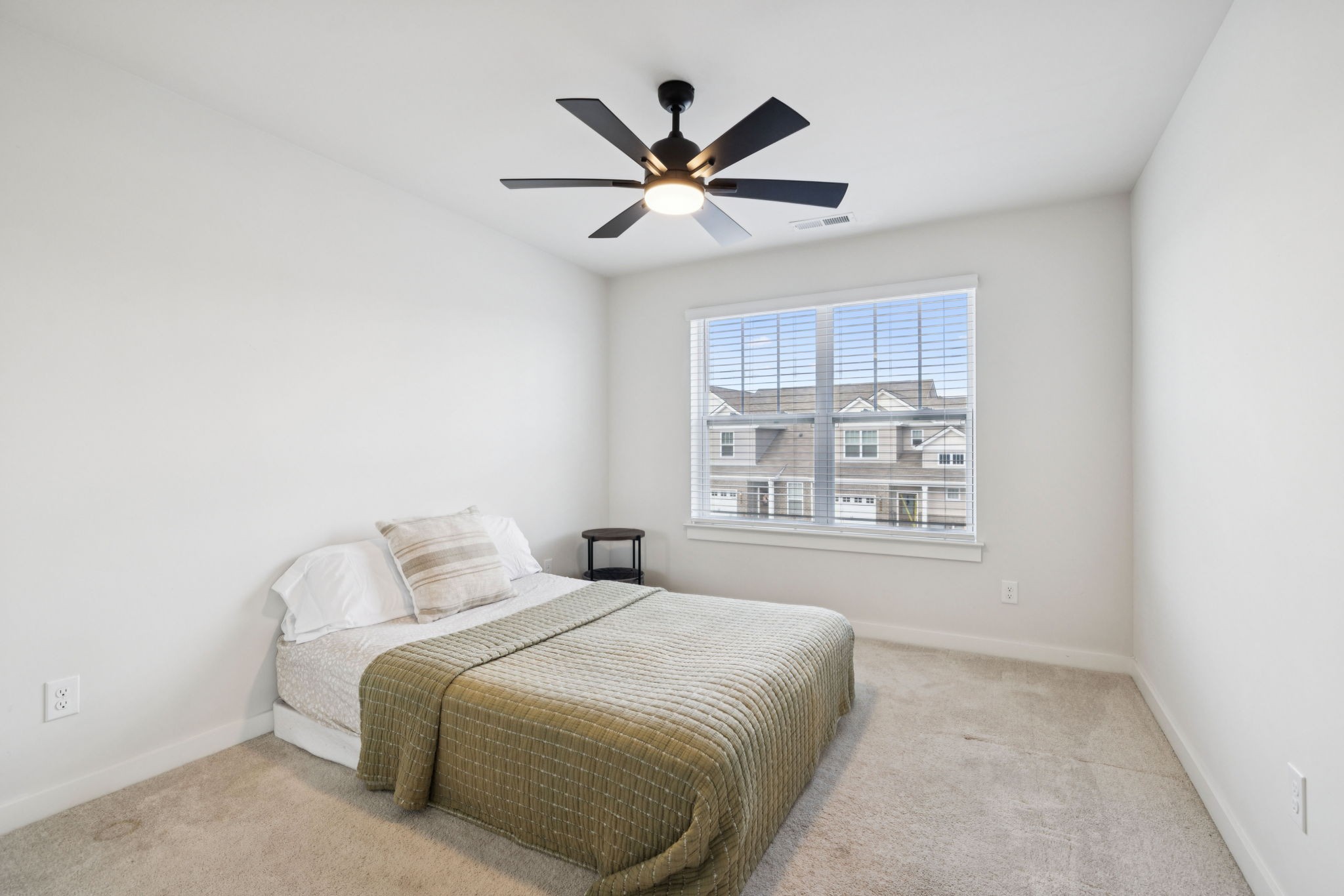 647 Birdie Drive Spring Hill, TN 37174 - Photo 9 of 15 a bedroom with a bed and window