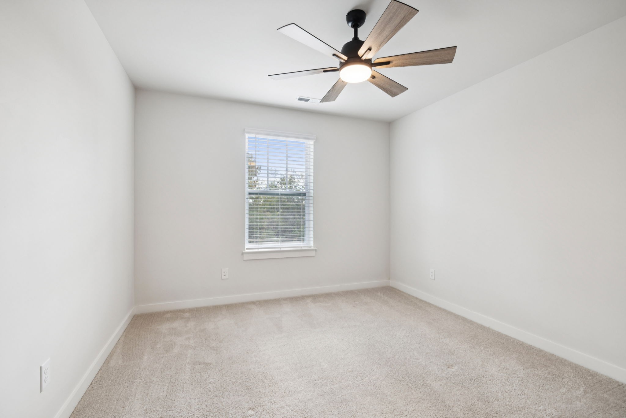 647 Birdie Drive Spring Hill, TN 37174 - Photo 10 of 15 an empty room with a window and a fan