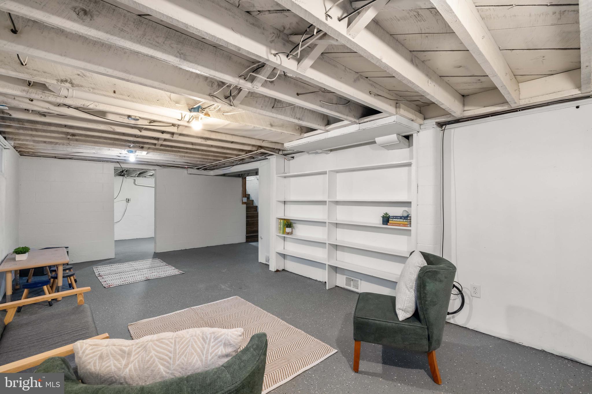 405 East 7th Avenue Ranson, WV 25438 - Photo 17 of 26 a room with furniture and a chandelier