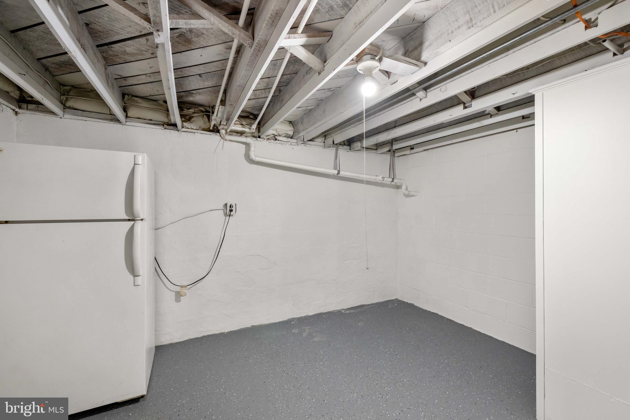 405 East 7th Avenue Ranson, WV 25438 - Photo 19 of 26 a view of a room with racks on the wall