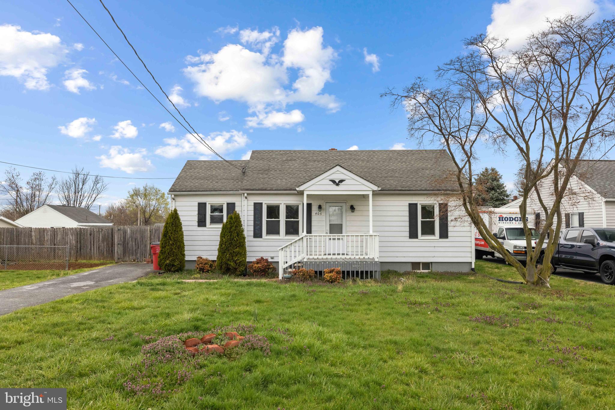405 East 7th Avenue Ranson, WV 25438 - Photo 2 of 26 a front view of a house with a yard and entertaining space