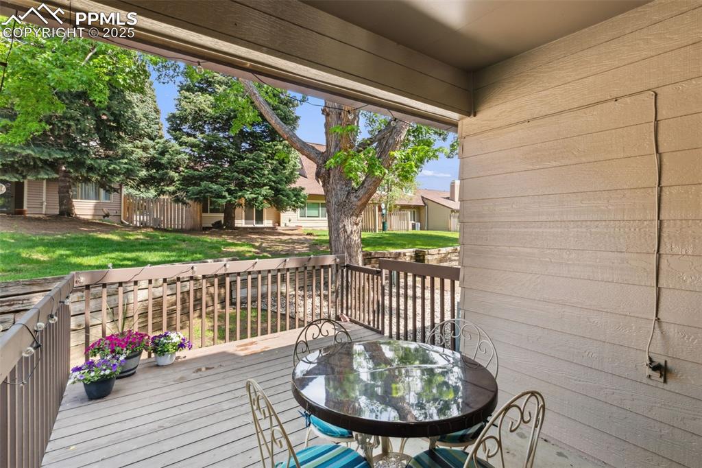 4835 Castledown Road Colorado Springs, CO 80917 - Photo 22 of 29 a view of a chairs and table in the patio