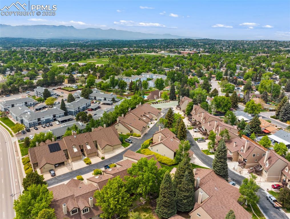 4835 Castledown Road Colorado Springs, CO 80917 - Photo 27 of 29 an aerial view of residential houses with outdoor space and trees all around