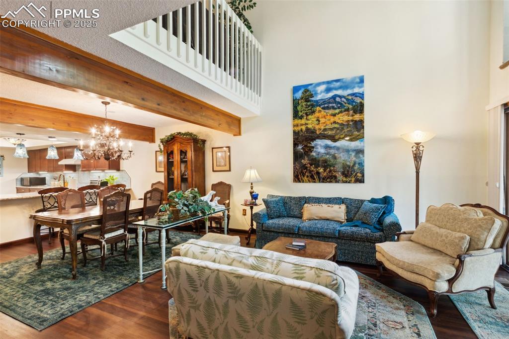 4835 Castledown Road Colorado Springs, CO 80917 - Photo 3 of 29 a living room with furniture and a large window