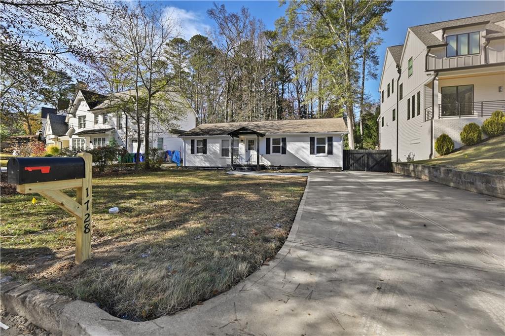 a view of a town with brick building and large trees