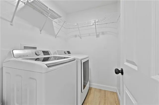 a utility room with dryer and washer