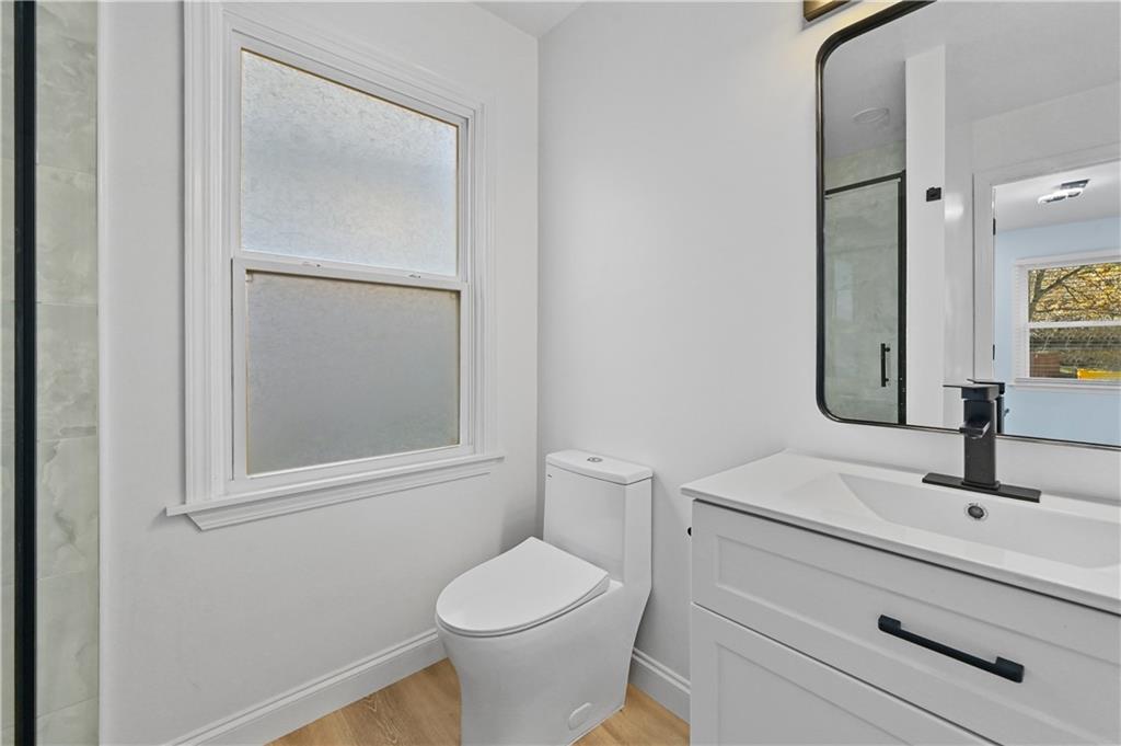 1728 Wayland Circle Northeast Brookhaven, GA 30319 - Photo 18 of 31 a bathroom with a sink toilet and shower