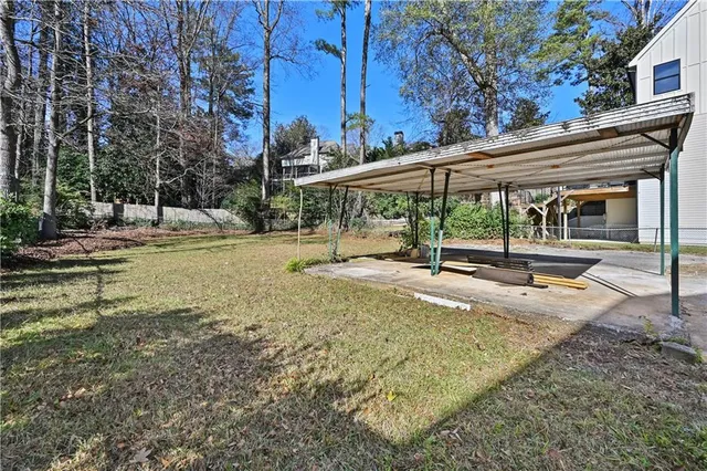 a view of a swimming pool with a patio