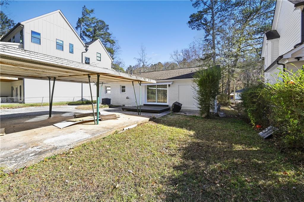 1728 Wayland Circle Northeast Brookhaven, GA 30319 - Photo 29 of 31 a house view with a backyard space