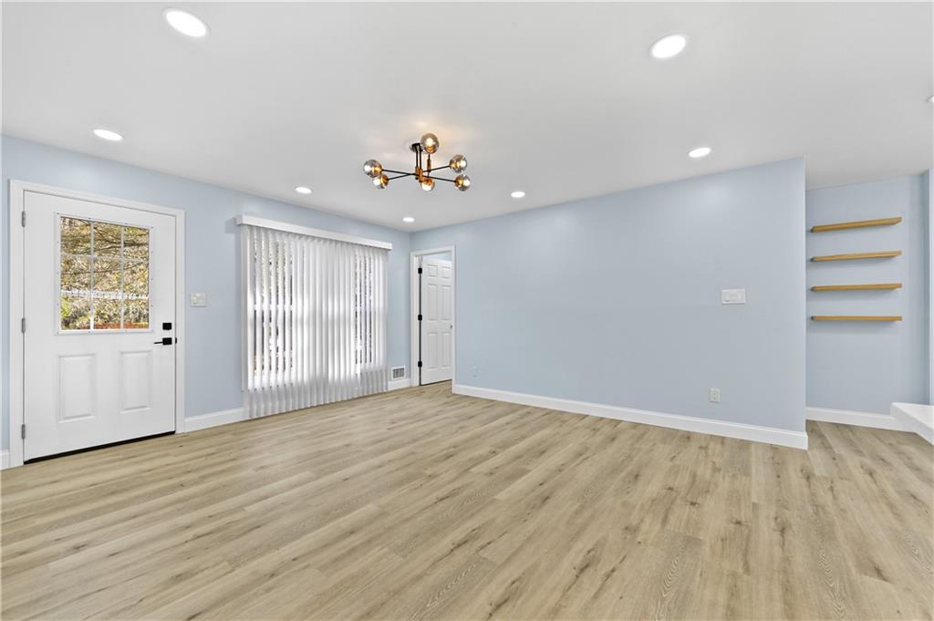 1728 Wayland Circle Northeast Brookhaven, GA 30319 - Photo 6 of 31 a view of an empty room with a window