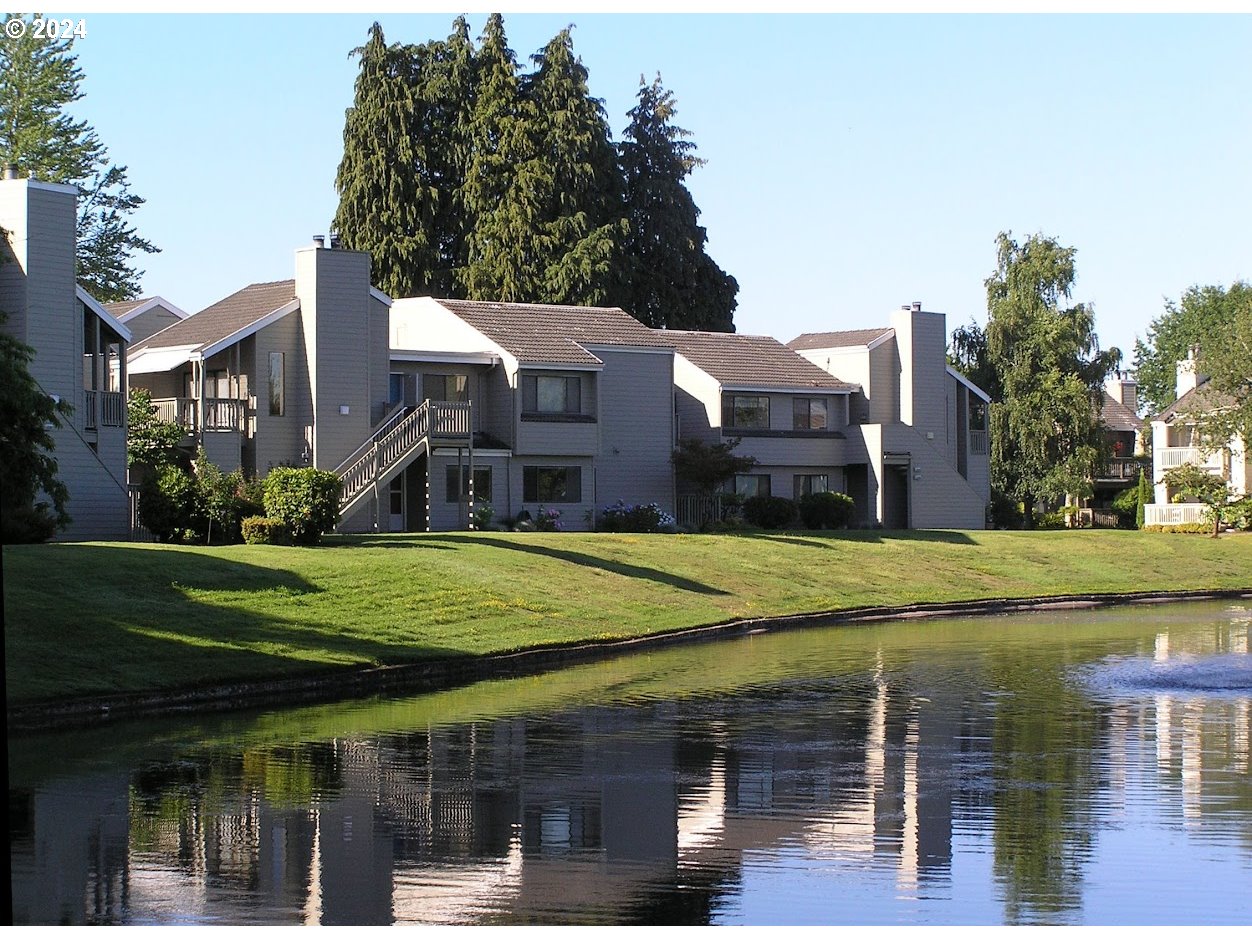 2051 Lake Isle Terrace Eugene, OR 97401 - Photo 27 of 36 front view of a house with a yard