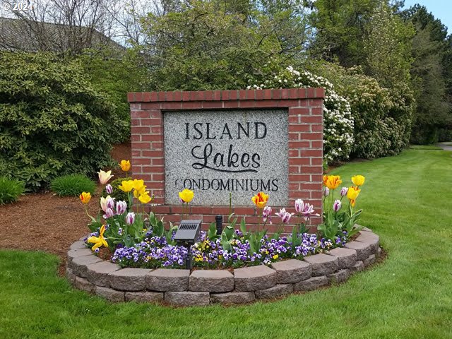 2051 Lake Isle Terrace Eugene, OR 97401 - Photo 32 of 36 a sign on the side of the road