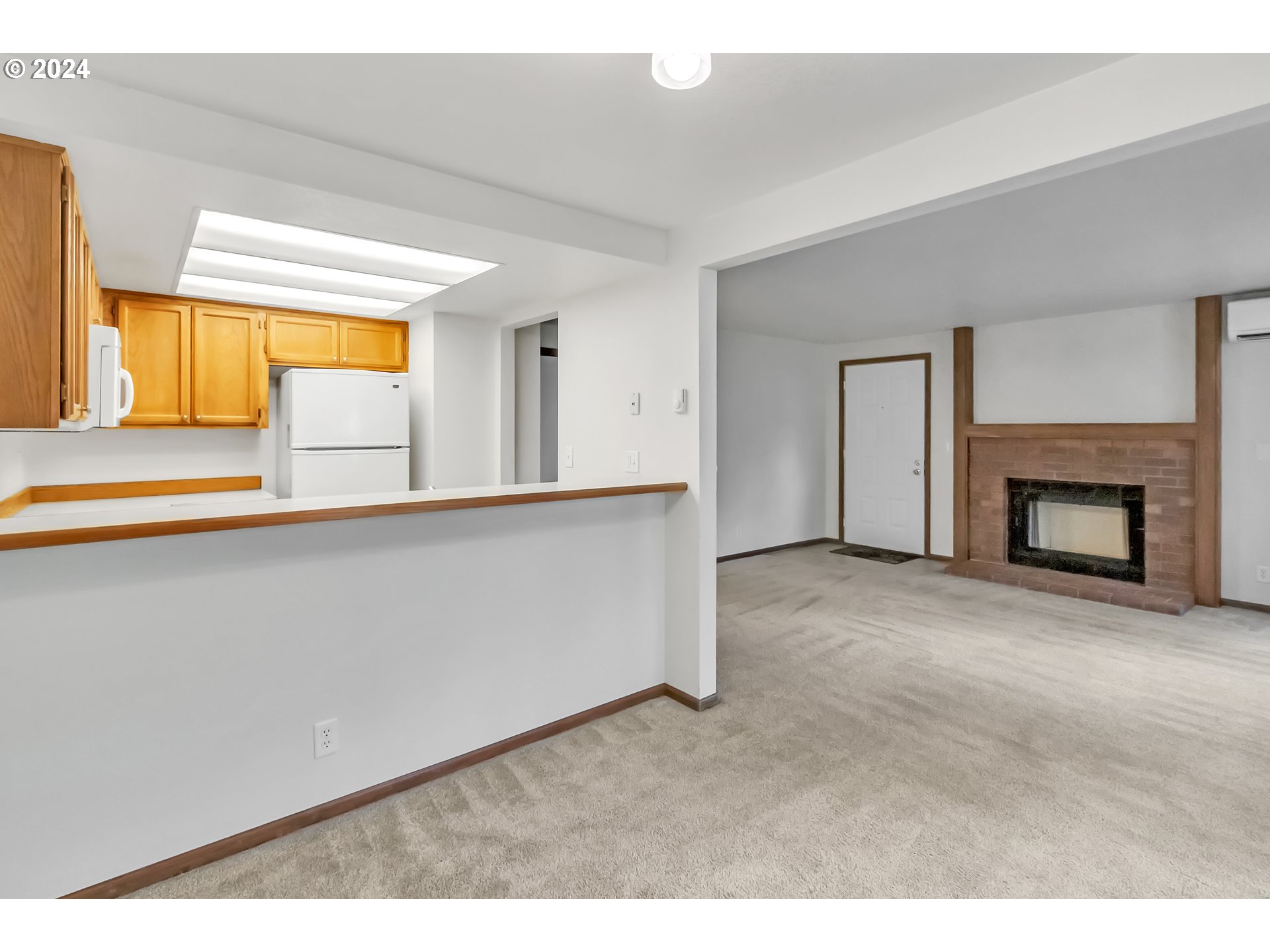 2051 Lake Isle Terrace Eugene, OR 97401 - Photo 7 of 36 a view of an empty room with a window