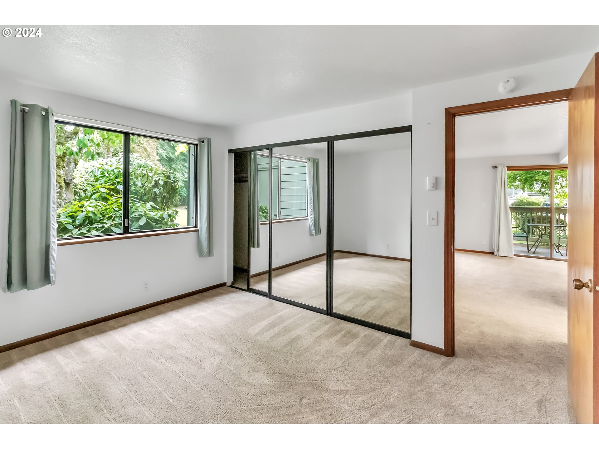 2051 Lake Isle Terrace Eugene, OR 97401 - Photo 10 of 36 a view of an empty room with a window