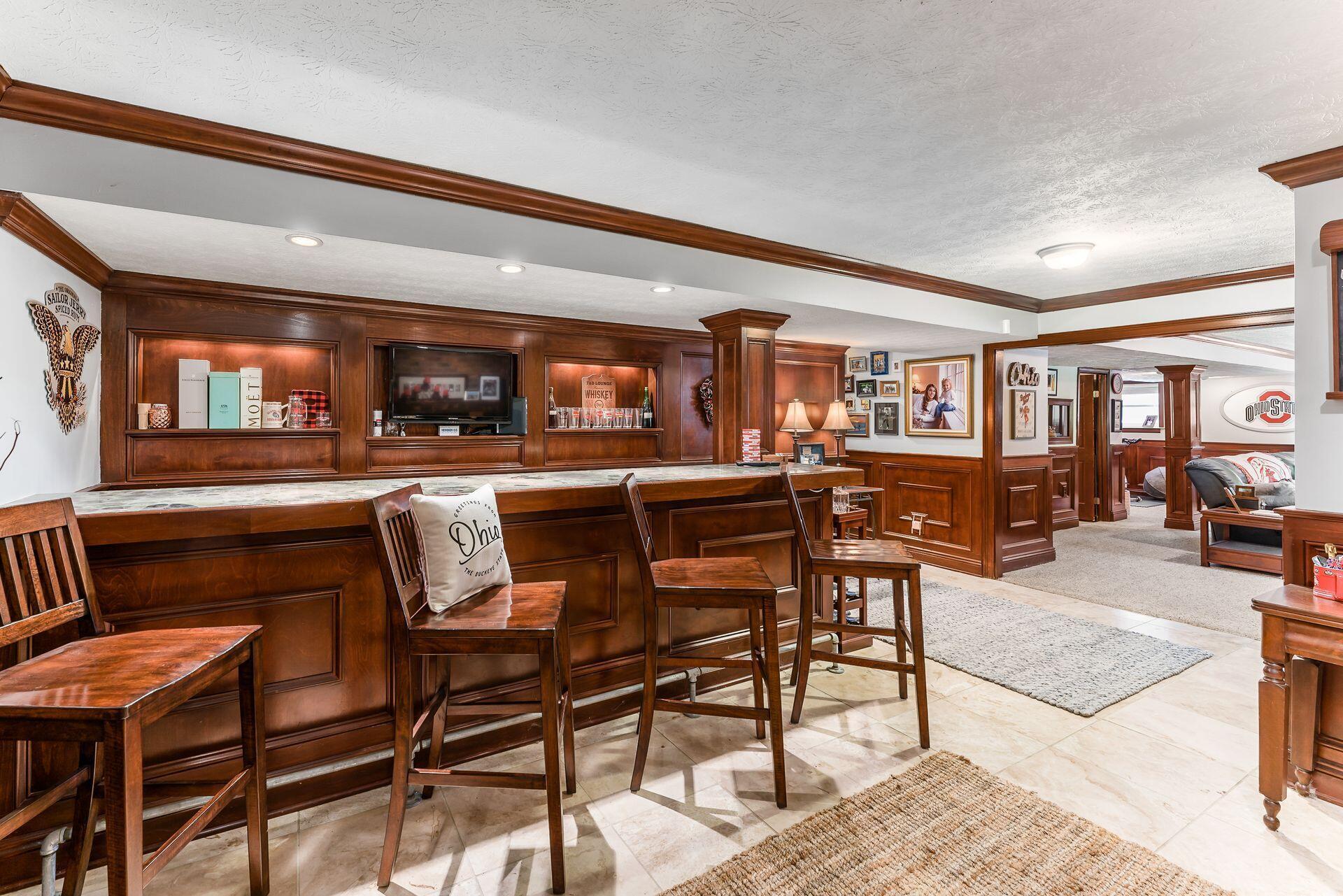 7080 Rieber Street Columbus, OH 43085 - Photo 25 of 55 Pub Style bar area in basement!