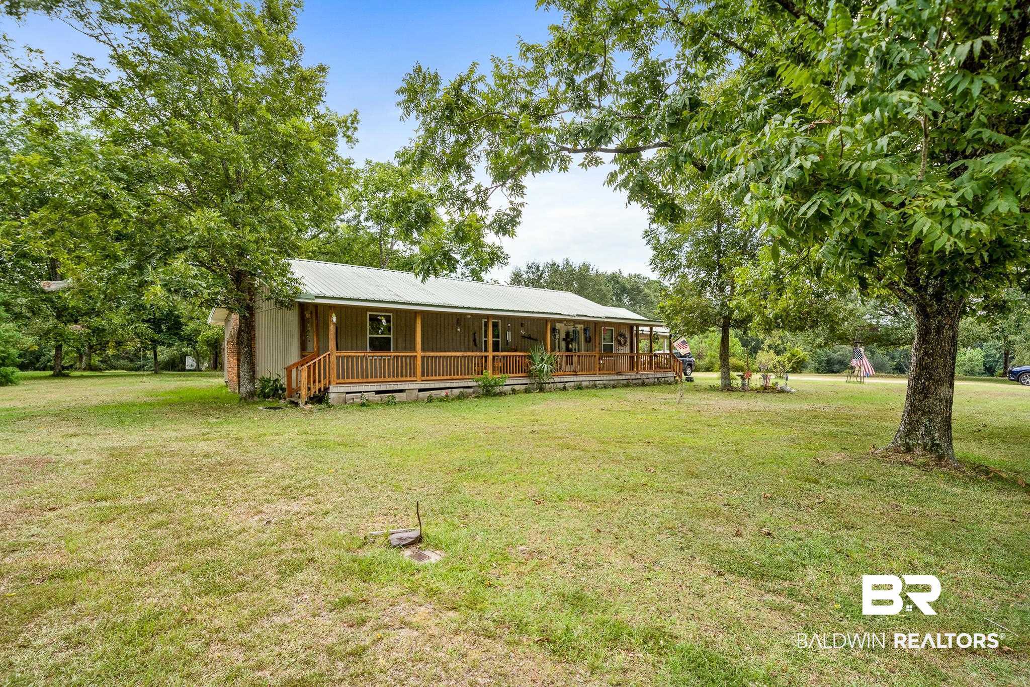 11528 Whitehouse Fork Road Bay Minette, AL 36507 - Photo 4 of 37 View of yard featuring a porch