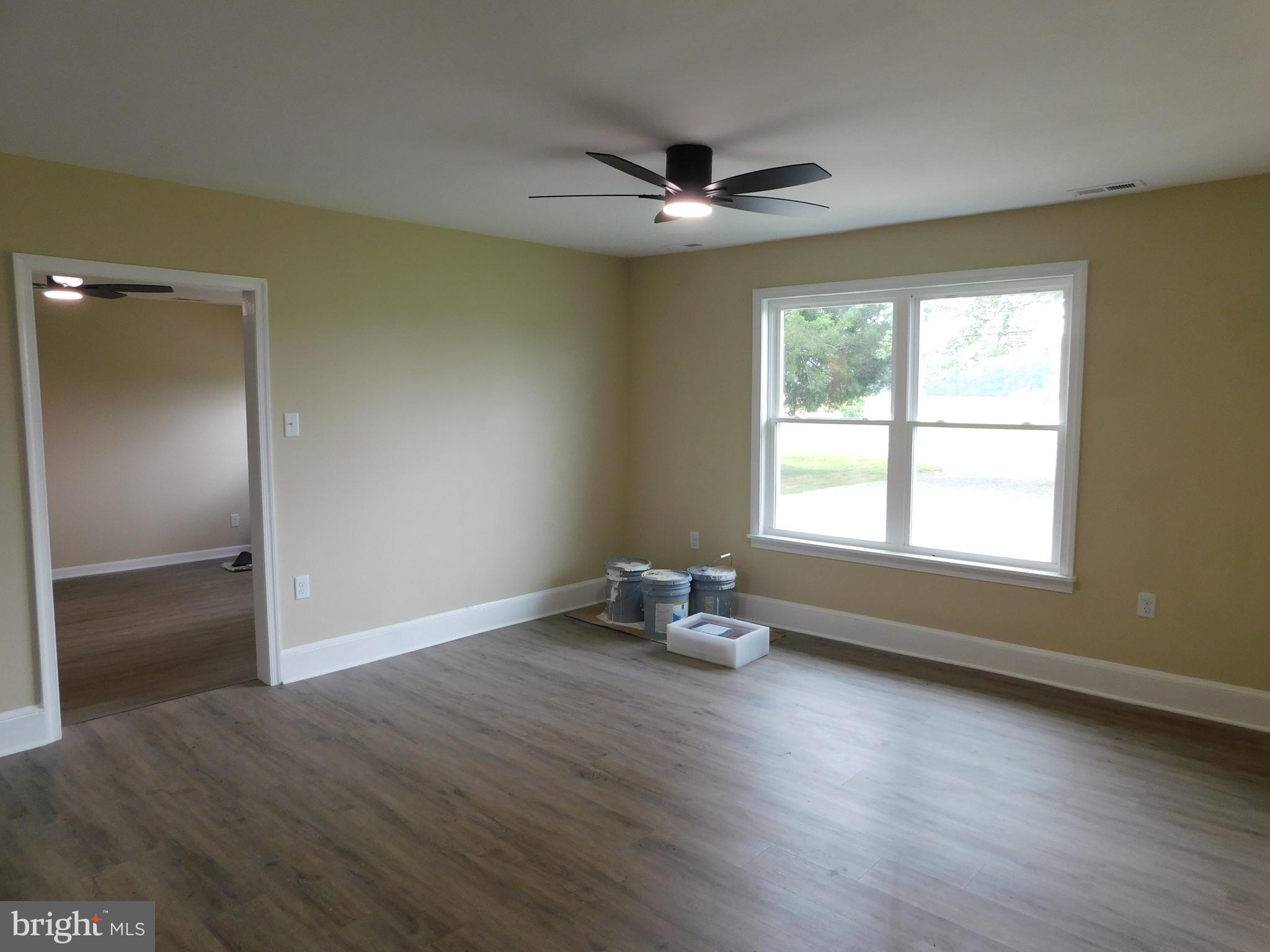 233 Hartly Road Hartly, DE 19953 - Photo 19 of 70 a view of room with window and wooden floor