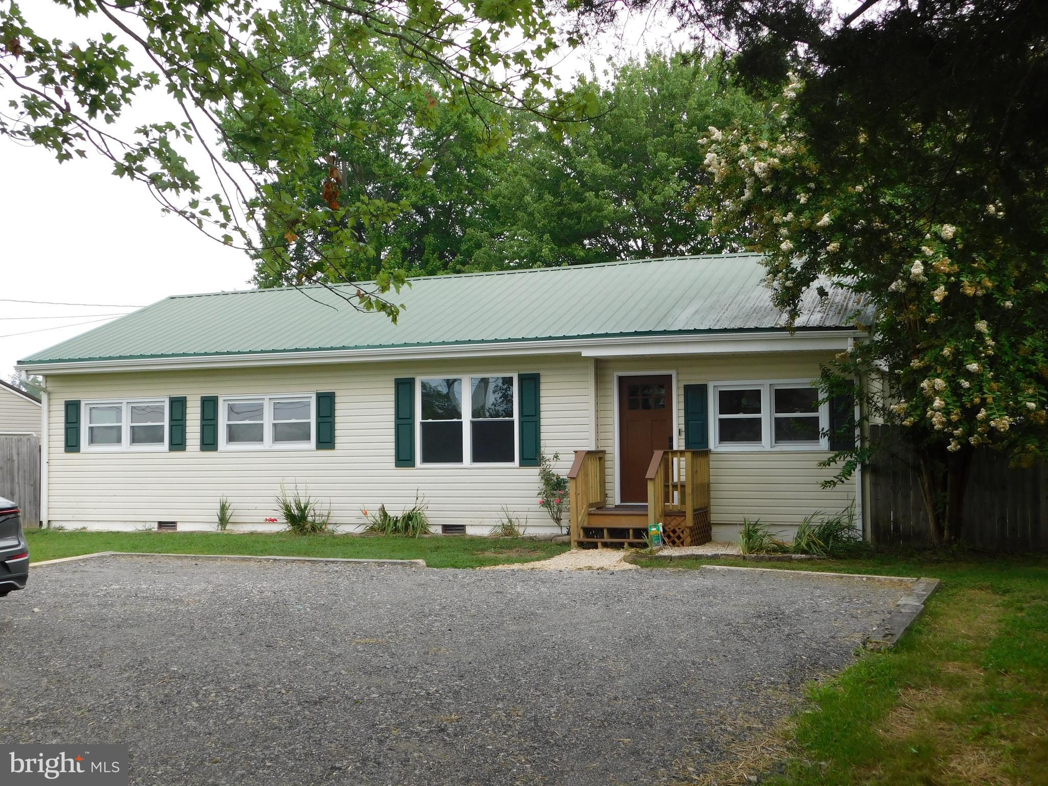 233 Hartly Road Hartly, DE 19953 - Photo 2 of 70 a front view of a house with garden