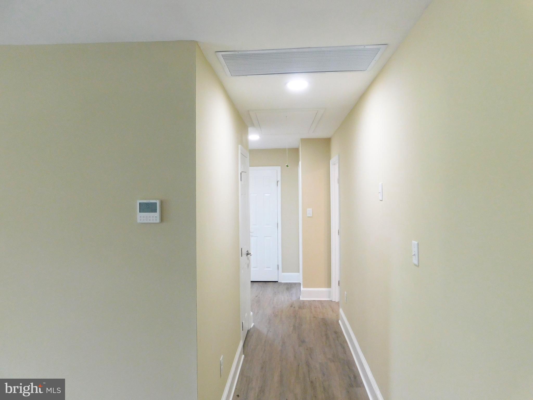 233 Hartly Road Hartly, DE 19953 - Photo 48 of 70 a view of a hallway with wooden floor