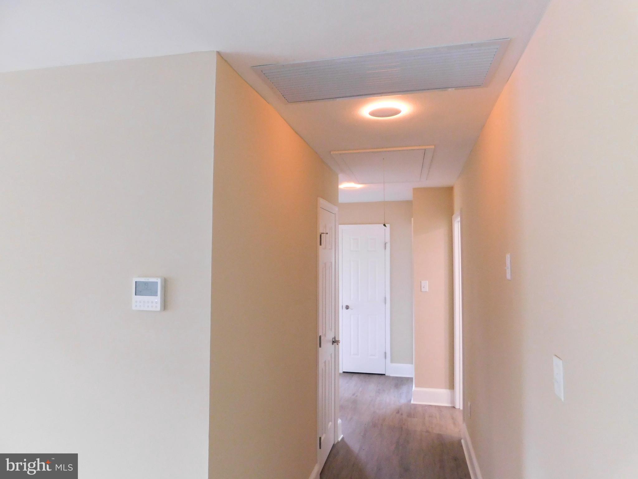 233 Hartly Road Hartly, DE 19953 - Photo 49 of 70 a view of a hallway with wooden floor