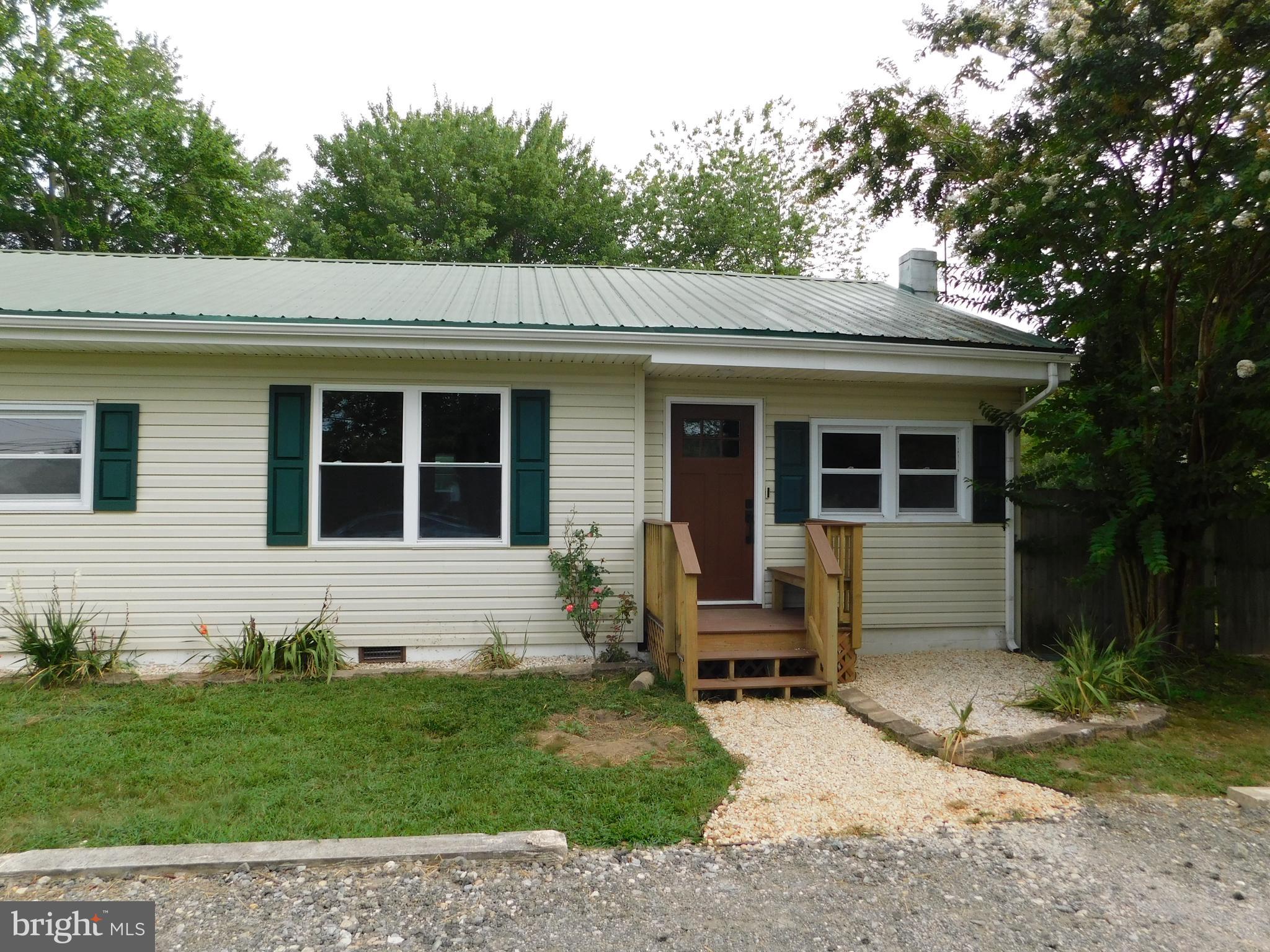 233 Hartly Road Hartly, DE 19953 - Photo 5 of 70 a view of a house with a yard in front of it