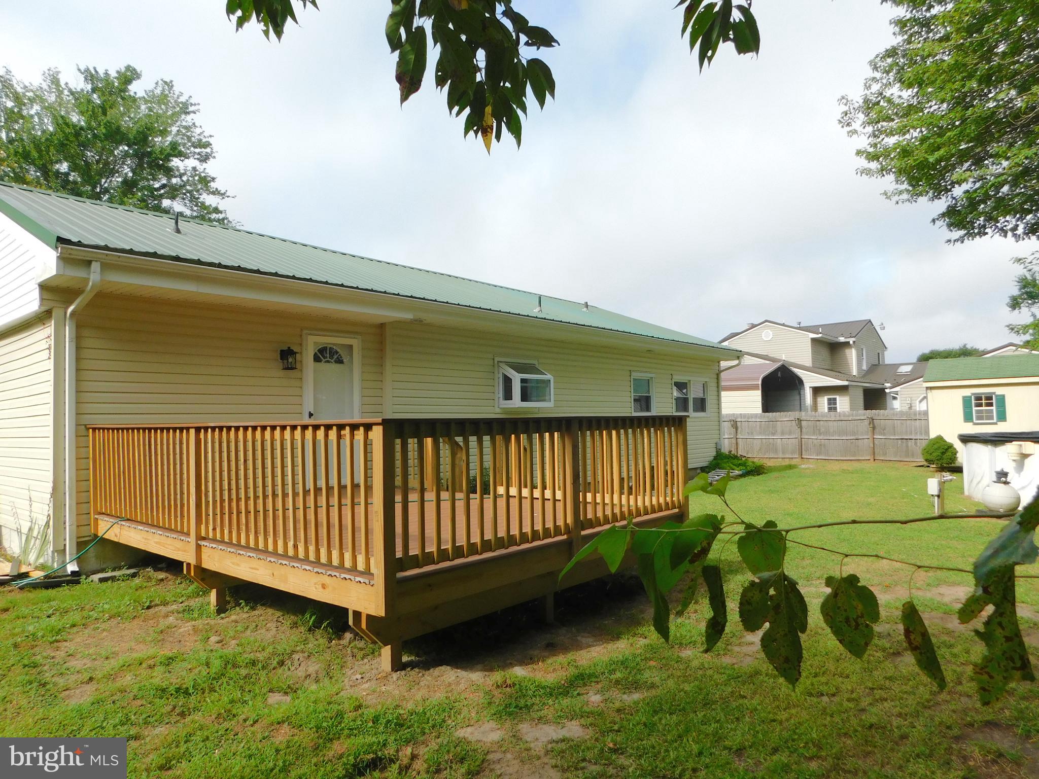 233 Hartly Road Hartly, DE 19953 - Photo 54 of 70 a view of a backyard with a garden