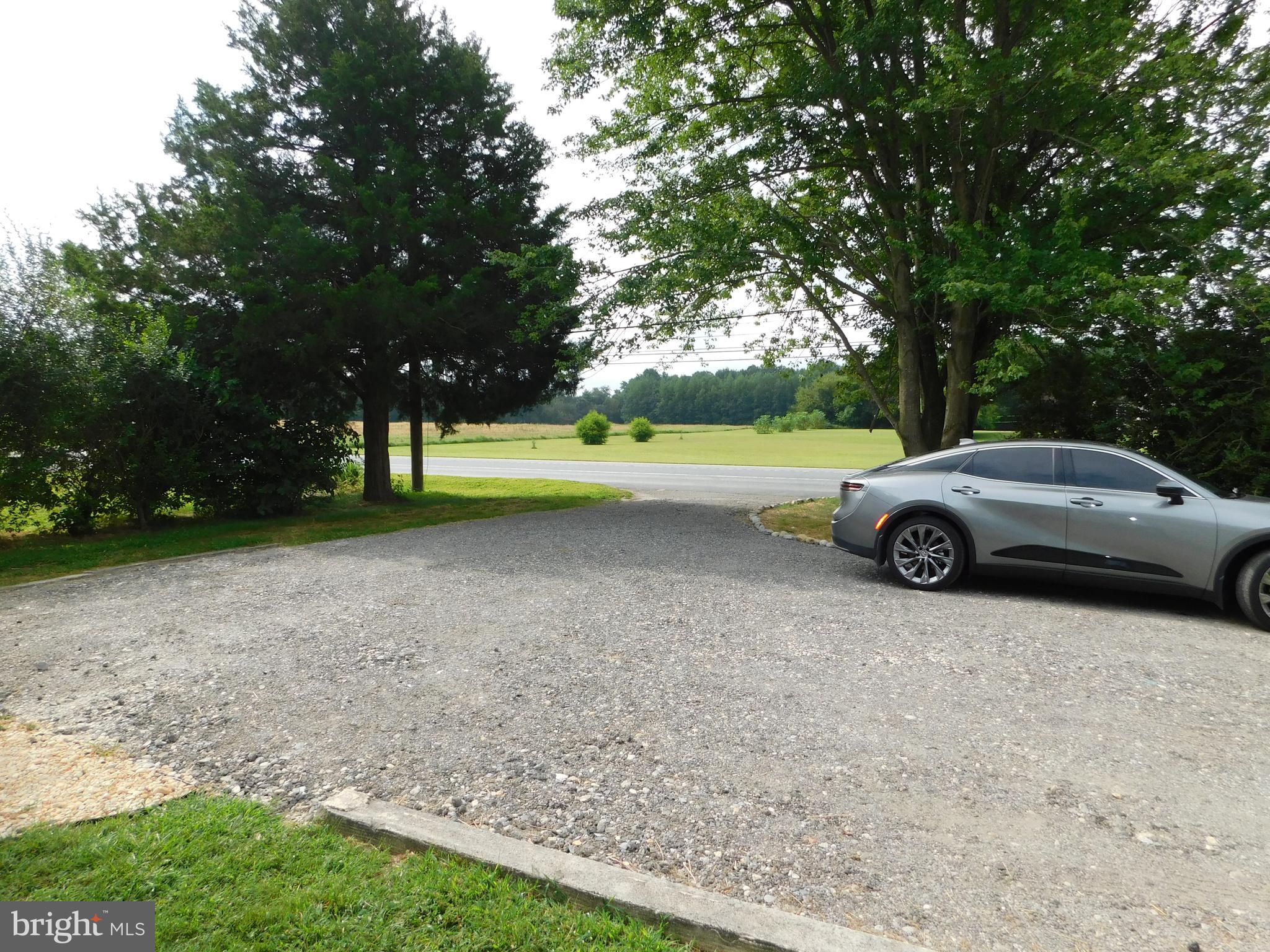 233 Hartly Road Hartly, DE 19953 - Photo 64 of 70 a front view of a house with garden