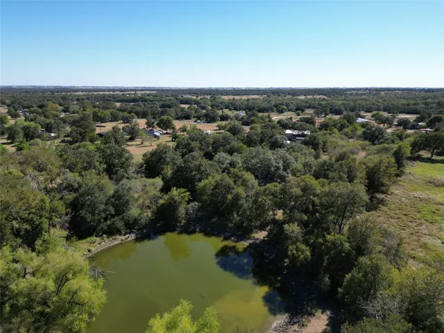 a view of a beach with a building in background