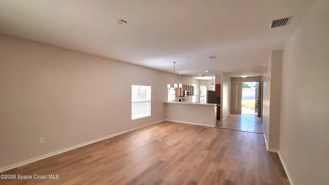 a view of an empty room and window