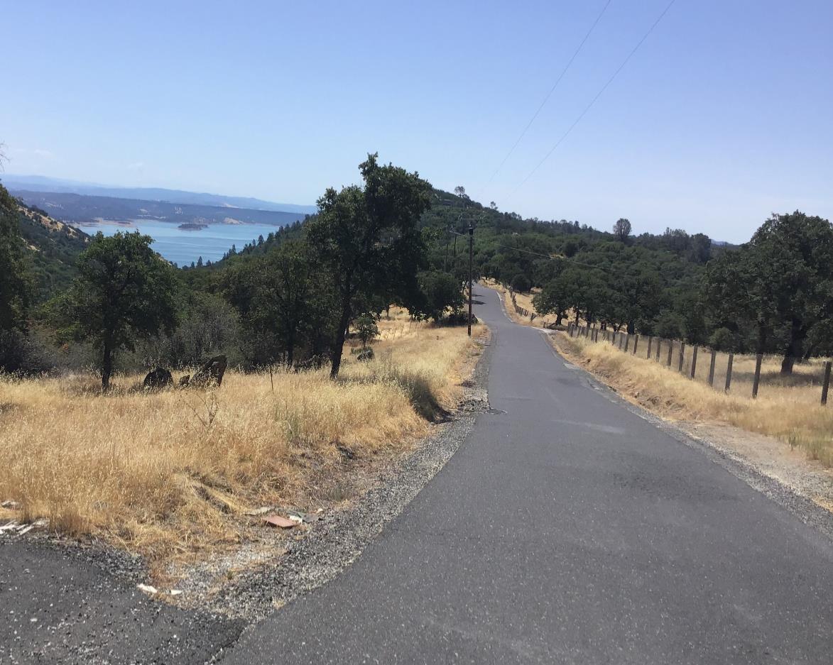 3071 Chestnut Way Angels Camp, CA 95222 - Photo 4 of 4 a view of a lake with mountain