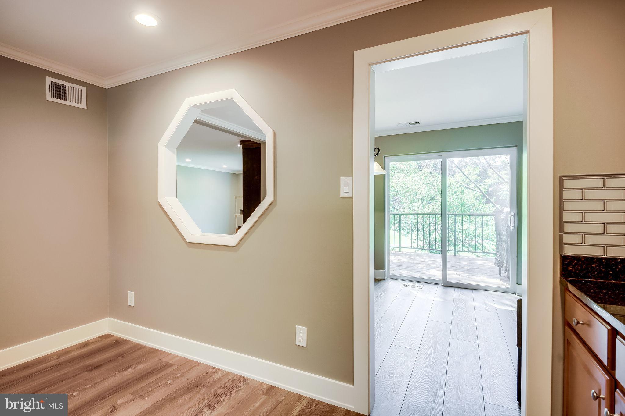 11629 Hunters Green Court Reston, VA 20191 - Photo 14 of 50 Kitchen to Dining/Deck