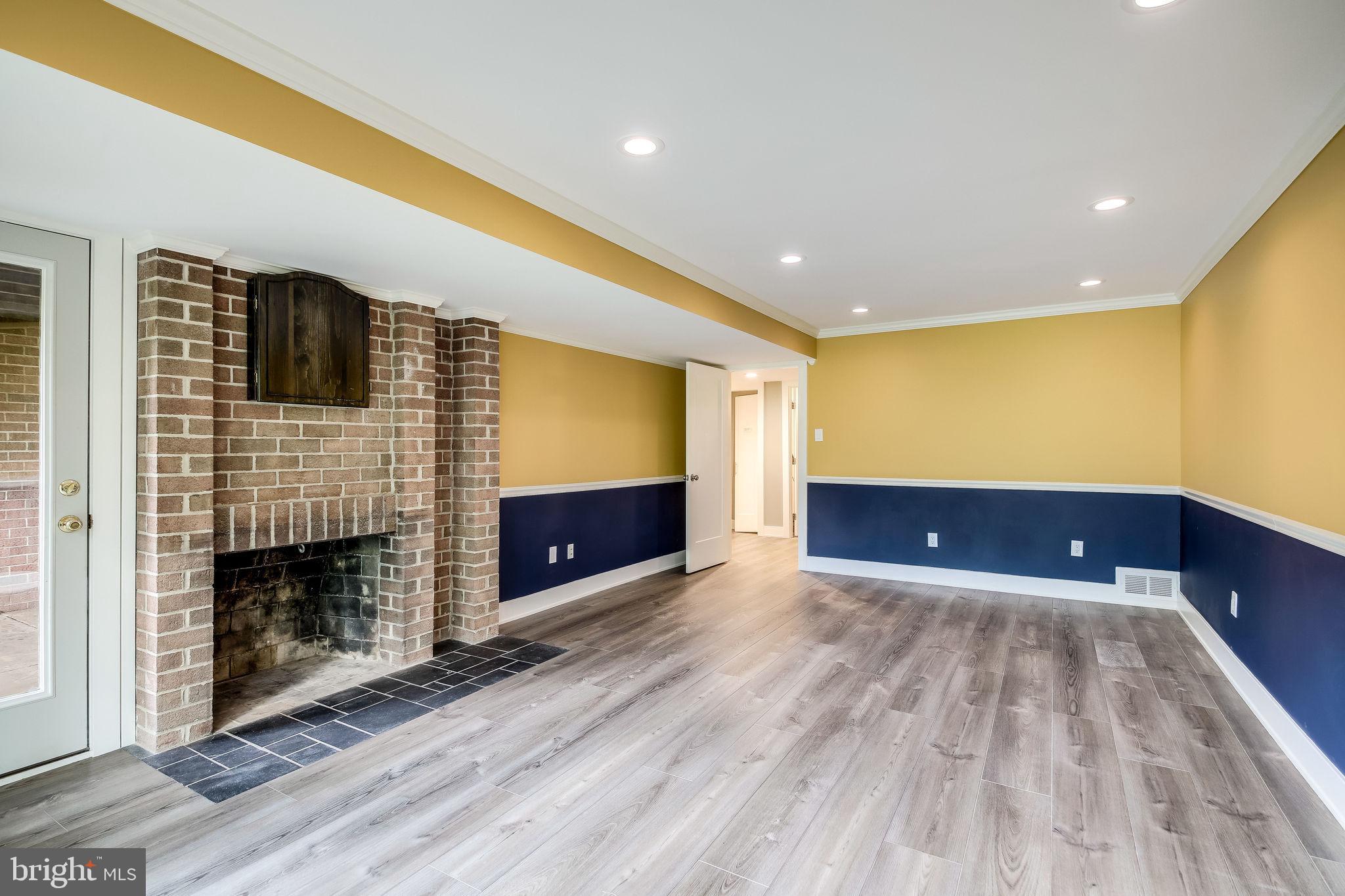 11629 Hunters Green Court Reston, VA 20191 - Photo 35 of 50 Large family room - lower level - wood burning FP