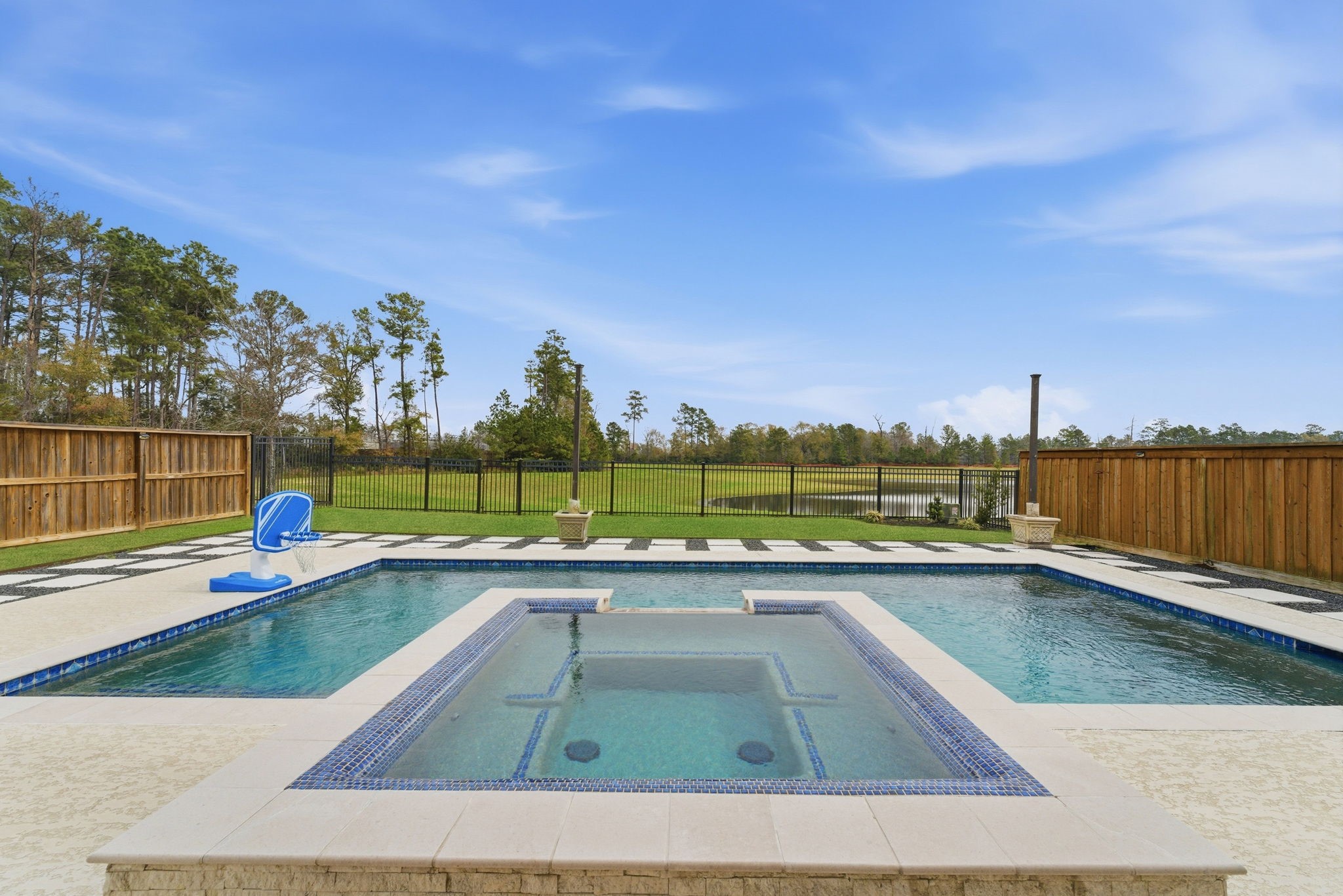 28117 Woodland Bend Way Spring, TX 77386 - Photo 32 of 48 Gorgeous pool with spa tub.