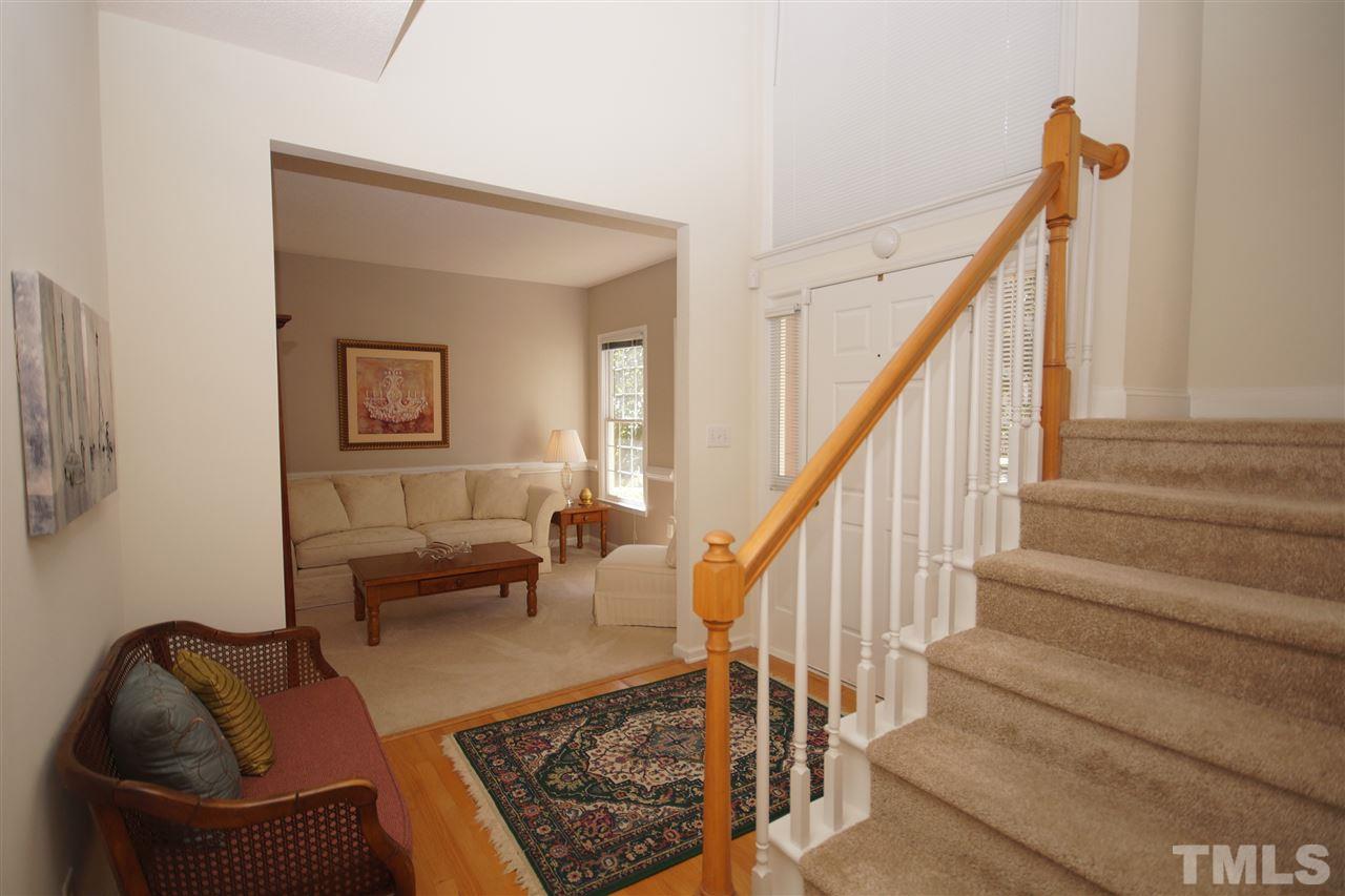 5249 Fairmead Circle Raleigh, NC 27613 - Photo 2 of 25 a living room with furniture and a rug