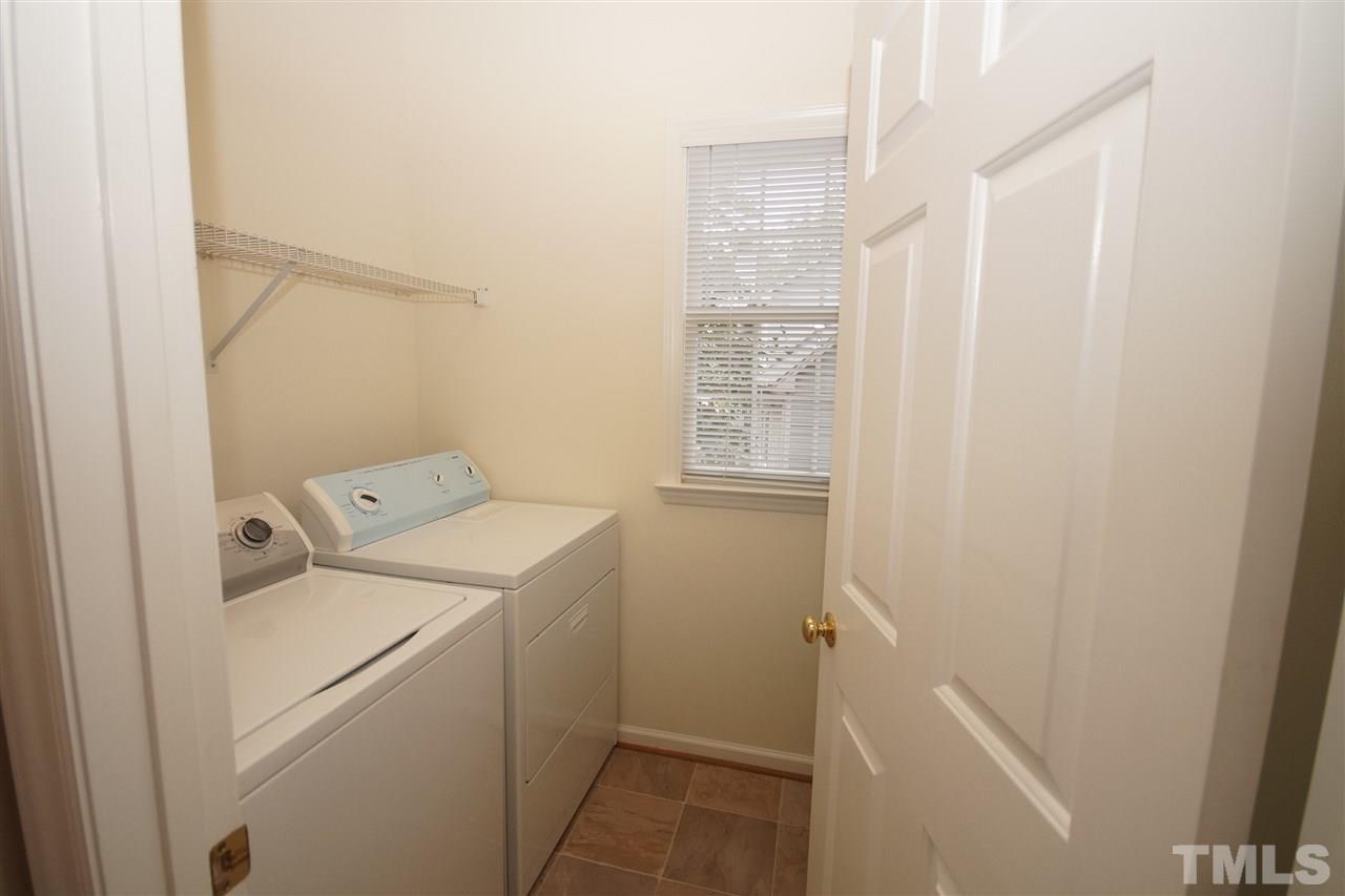 5249 Fairmead Circle Raleigh, NC 27613 - Photo 11 of 25 a utility room with dryer and washer