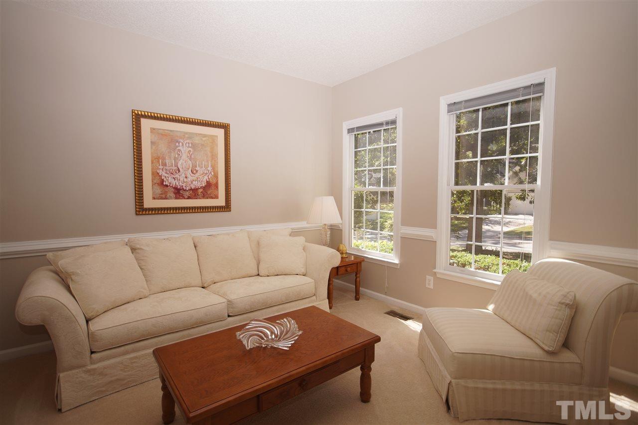 5249 Fairmead Circle Raleigh, NC 27613 - Photo 4 of 25 a living room with furniture and a window