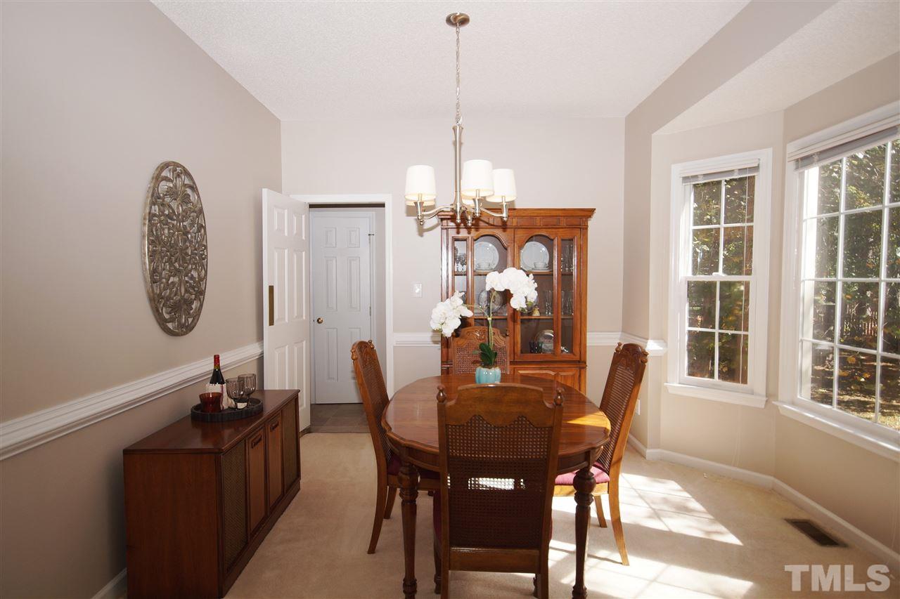 5249 Fairmead Circle Raleigh, NC 27613 - Photo 5 of 25 a dining room with furniture and window