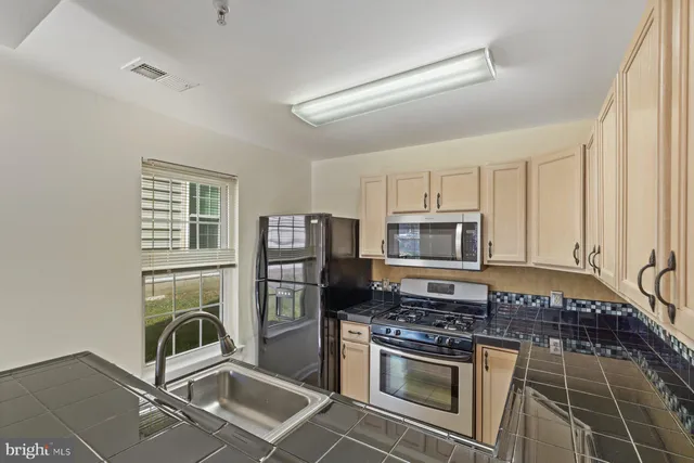 $1,975 | 8901 Stone Creek Place, Unit T3, Pikesville, MD 21208