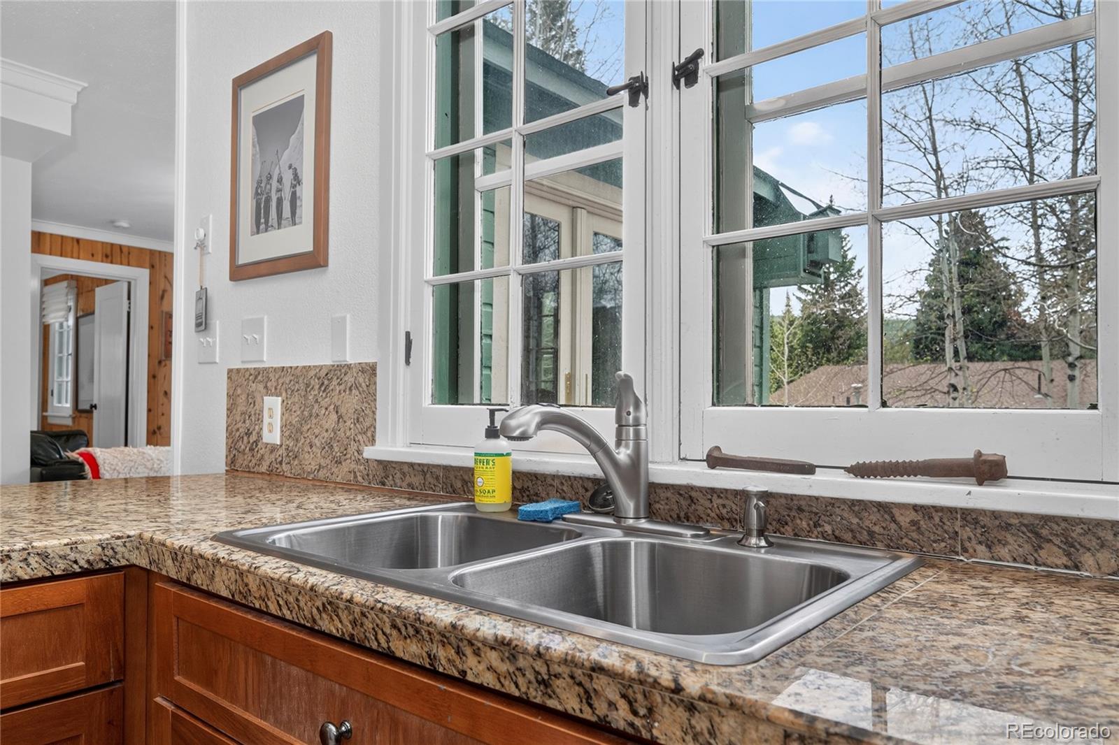 327 Vasquez Road, Unit E1 Winter Park, CO 80482 - Photo 35 of 43 a kitchen with a sink and a window