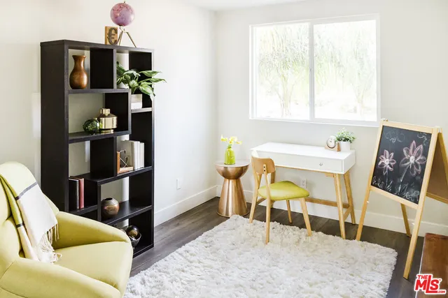 a bathroom with a toilet and a sink