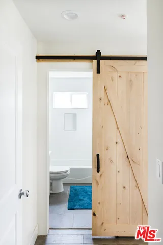 a bathroom with a sink and a toilet