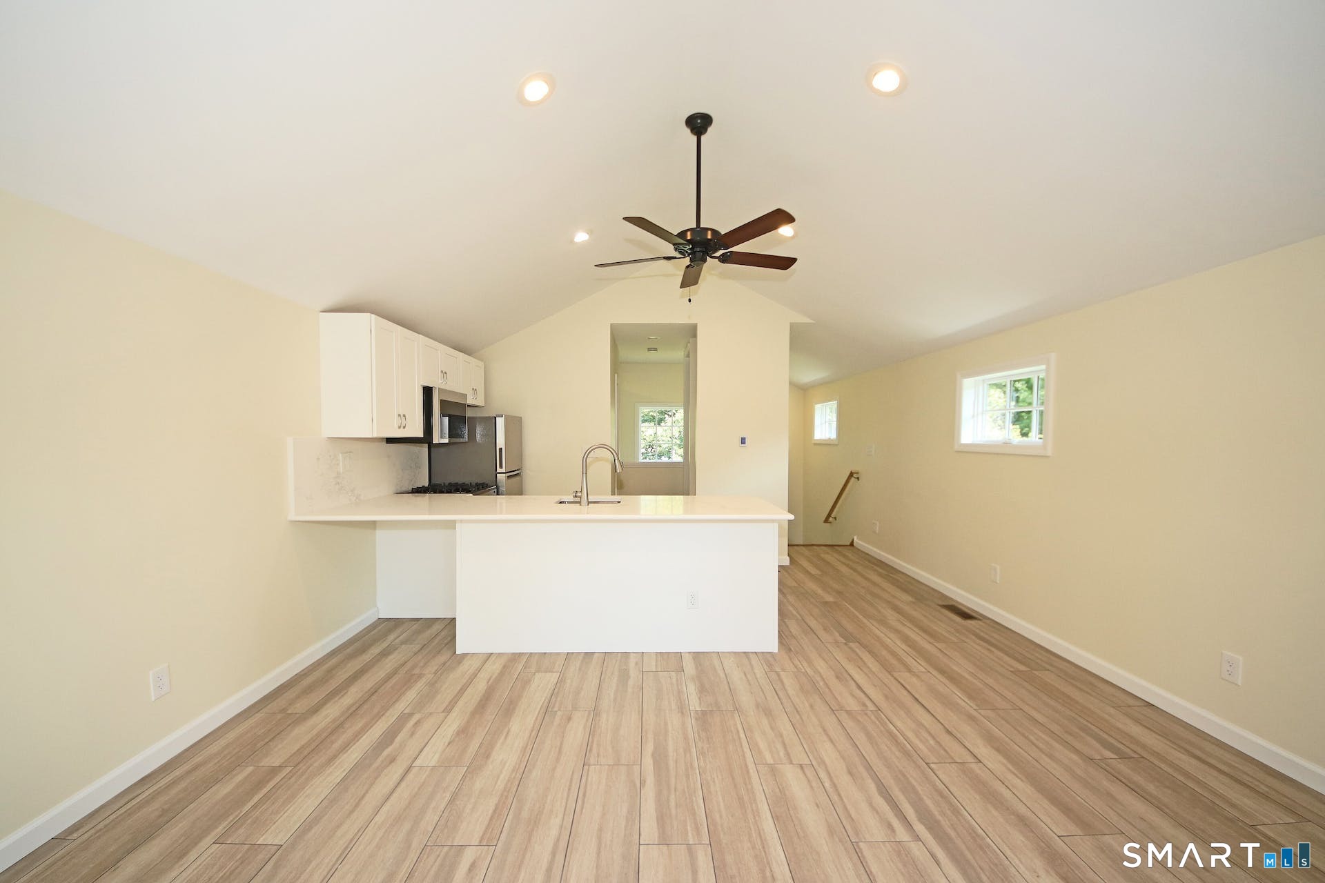 3509 Redding Road Fairfield, CT 06824 - Photo 19 of 27 a view of kitchen with sink and wooden floor
