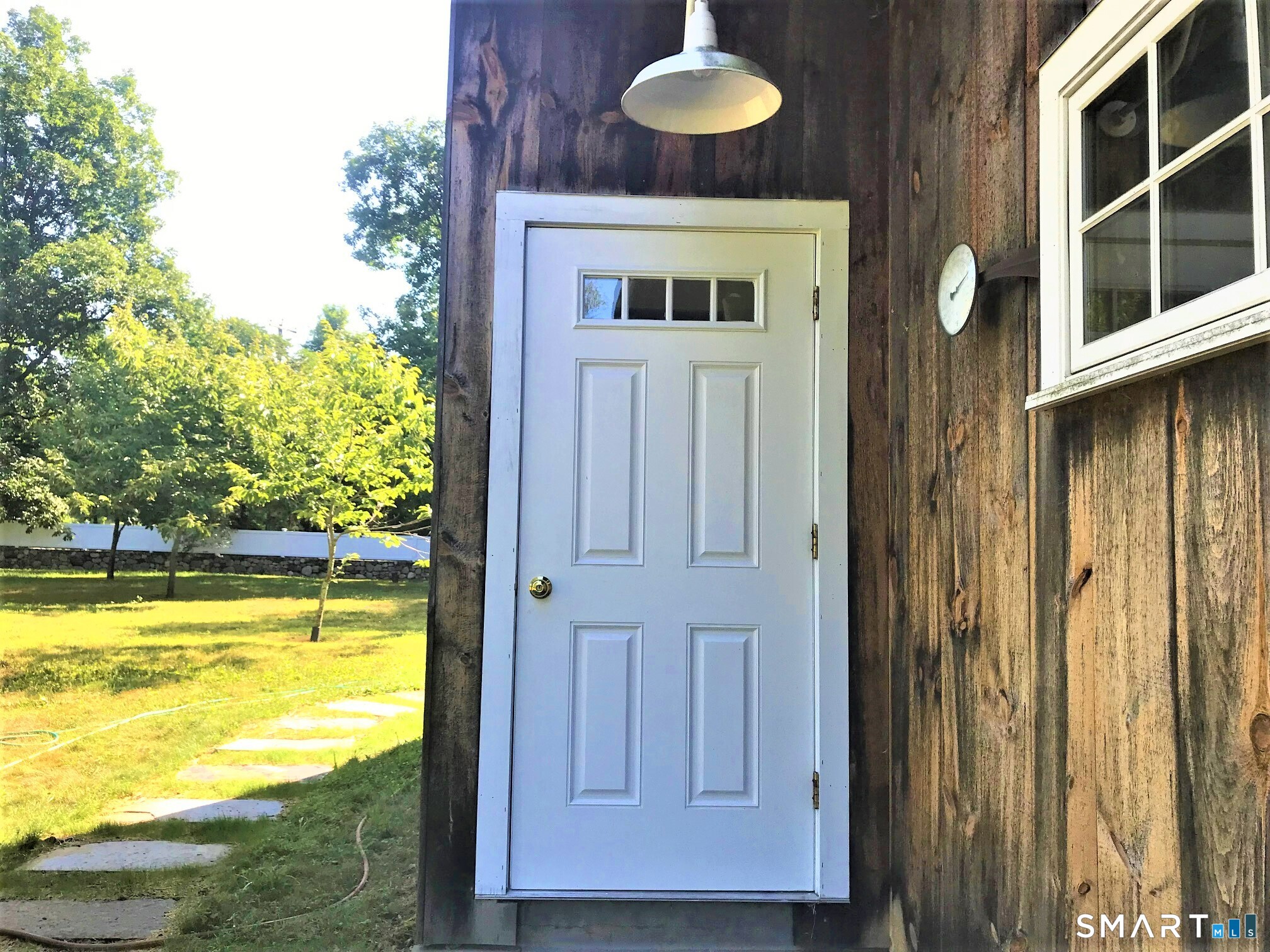 3509 Redding Road Fairfield, CT 06824 - Photo 9 of 27 a view of a livingroom with furniture and garden