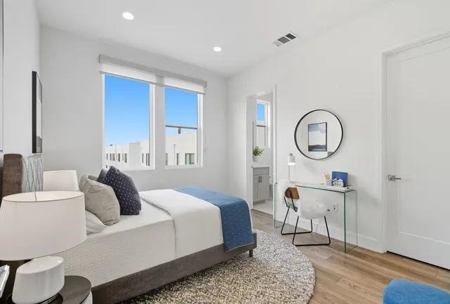a bathroom with a shower and a bath tub