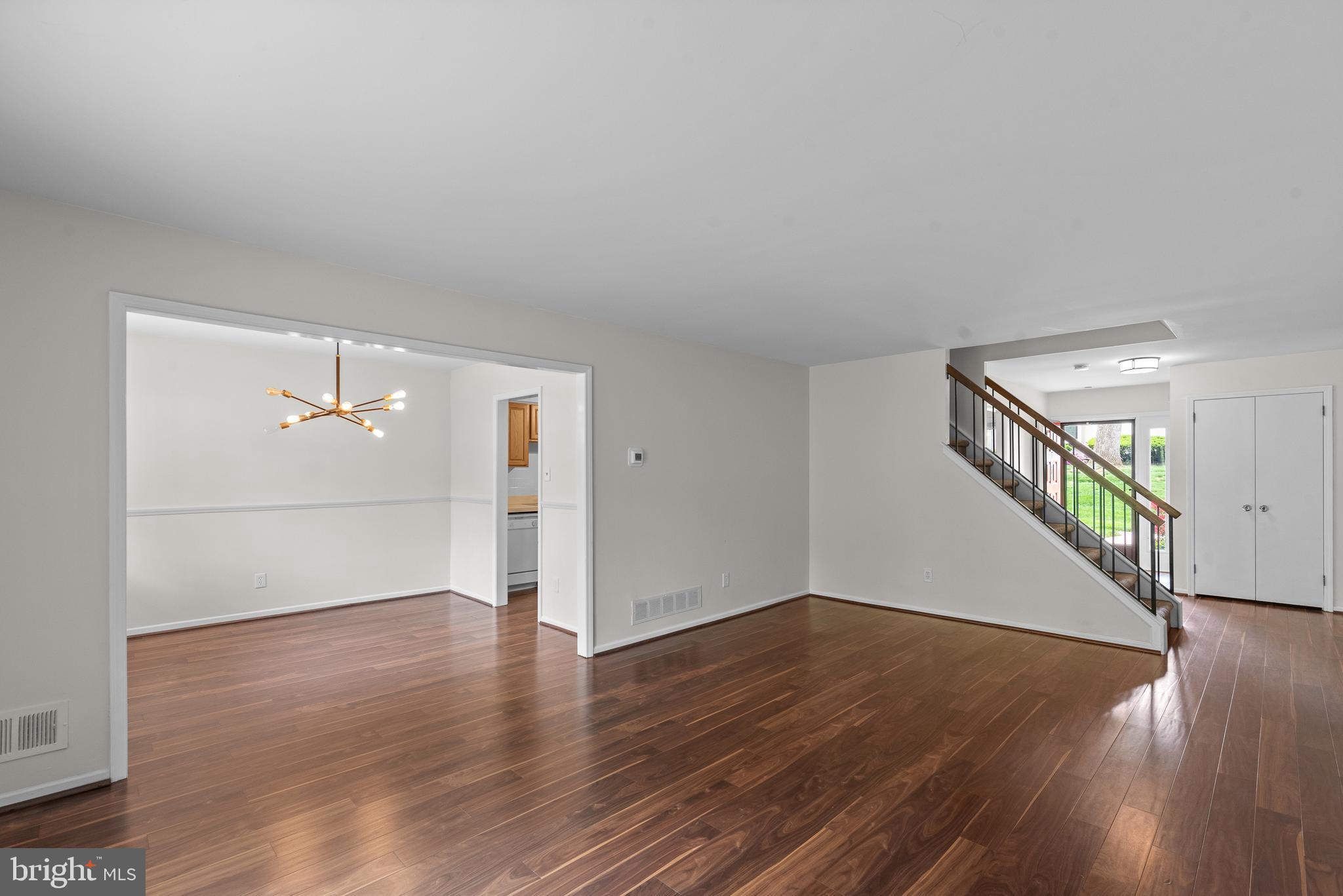 1101 Brinton Place Road, Unit 9 West Chester, PA 19380 - Photo 12 of 26 a view of an empty room with wooden floor and a window