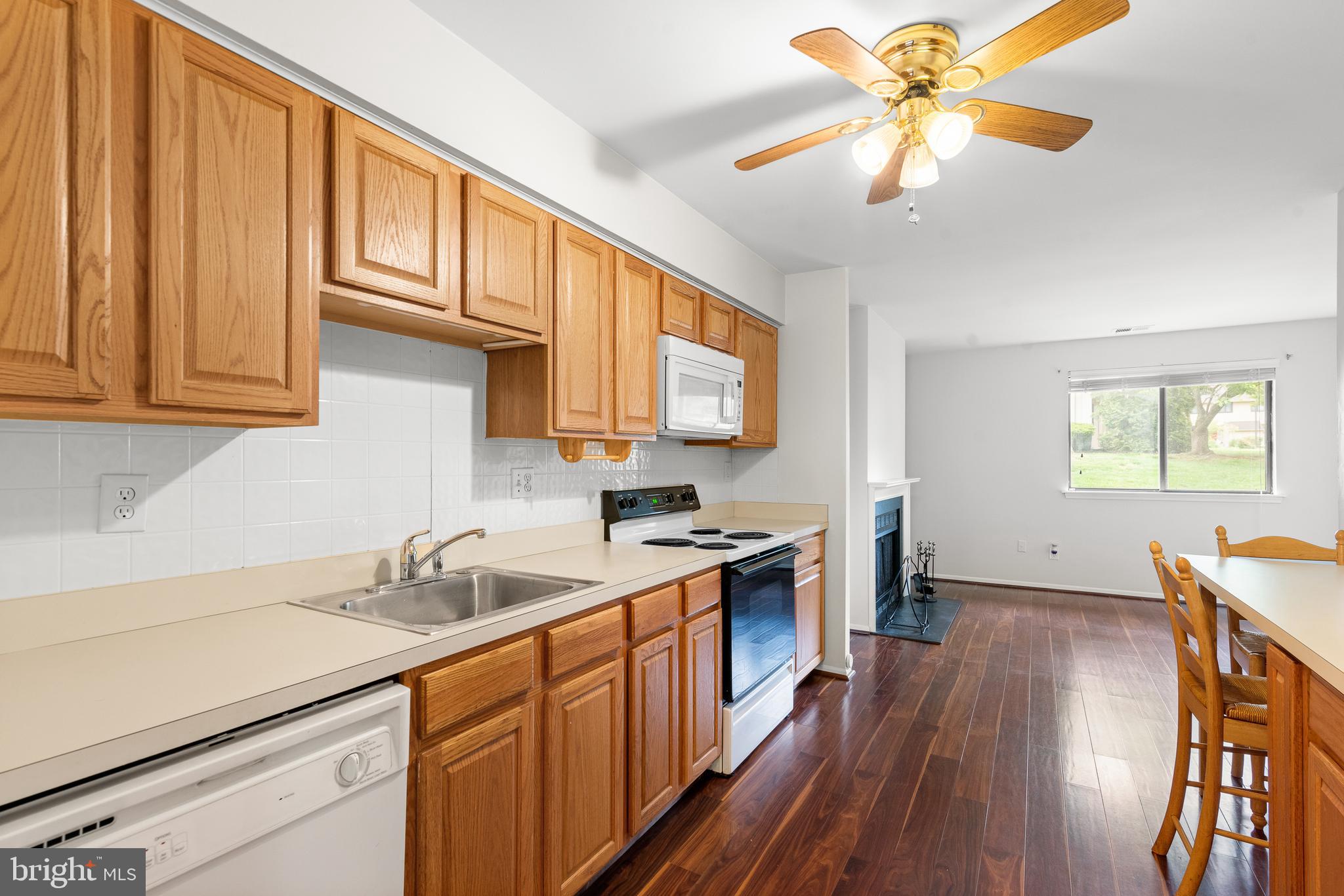1101 Brinton Place Road, Unit 9 West Chester, PA 19380 - Photo 10 of 26 a kitchen with a sink appliances cabinets and a window